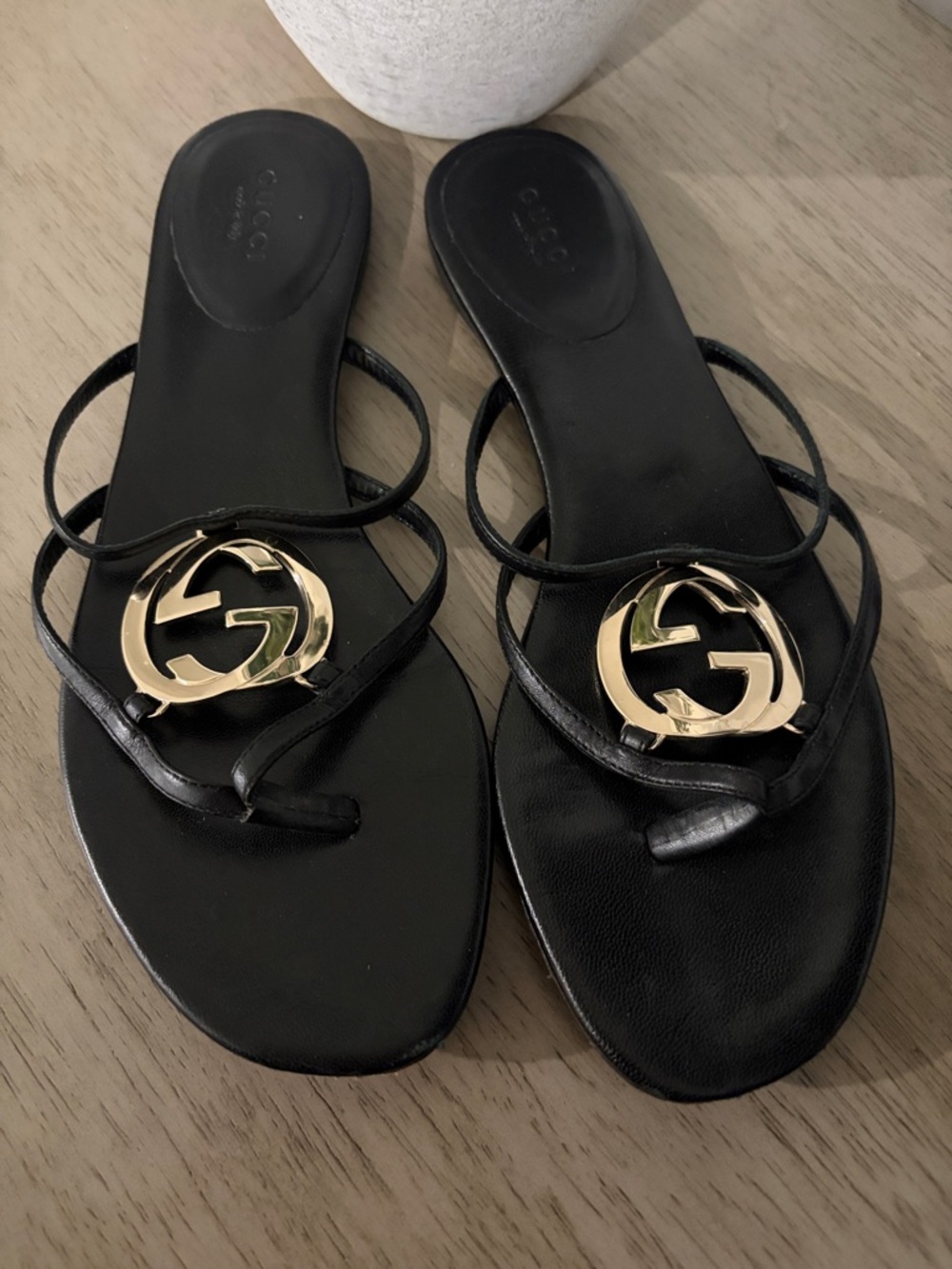Gucci Black Leather Sandal with Gold Logo Medallion